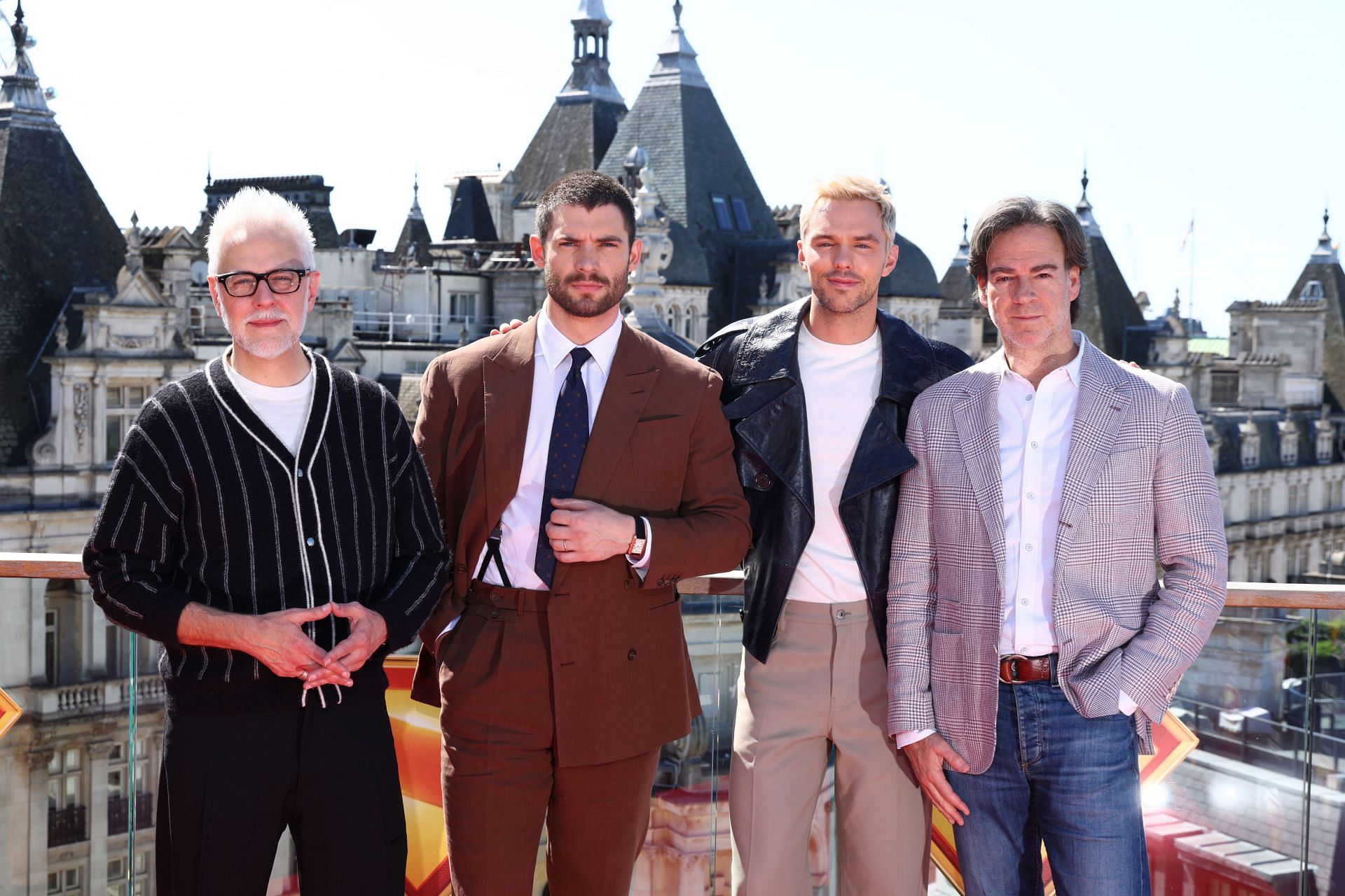 James Gunn with David Corenswett and the cast of Superman (Image via Getty)